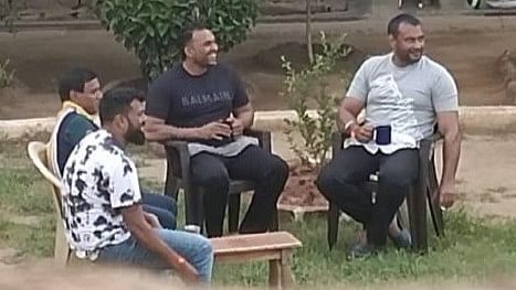 <div class="paragraphs"><p>Kannada film star Darshan Thoogudeepa (on the right), rowdy 'Wilson Garden' Naga (next to Darshan), and the actor's manager Nagaraj (on the extreme left). </p></div>